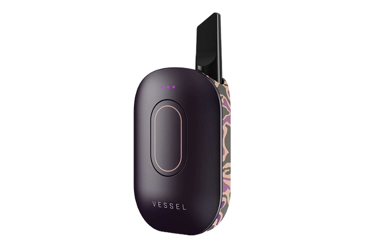 Vessel Compass Sahara vape device with patterned back panel and charging dock