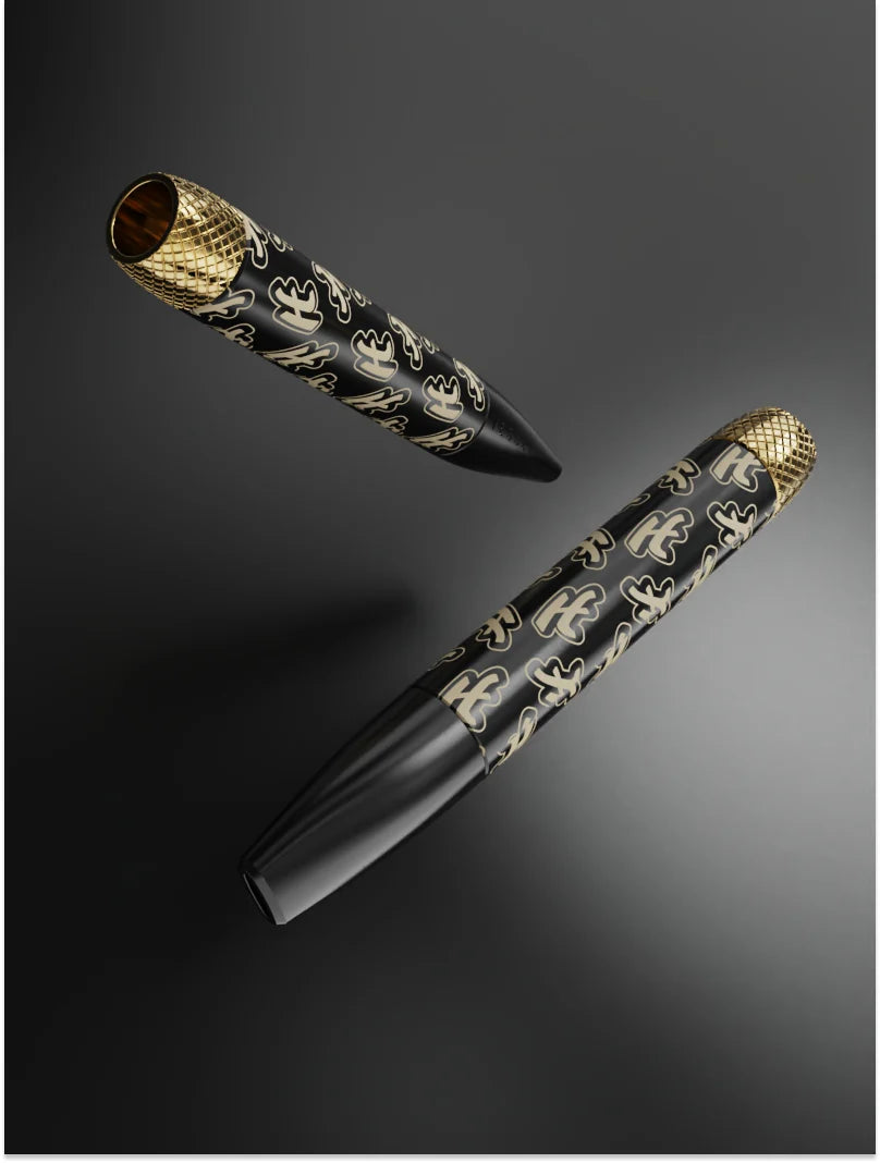 Vessel One Hitter Highsman Edition device with gold mesh tip and black patterned body