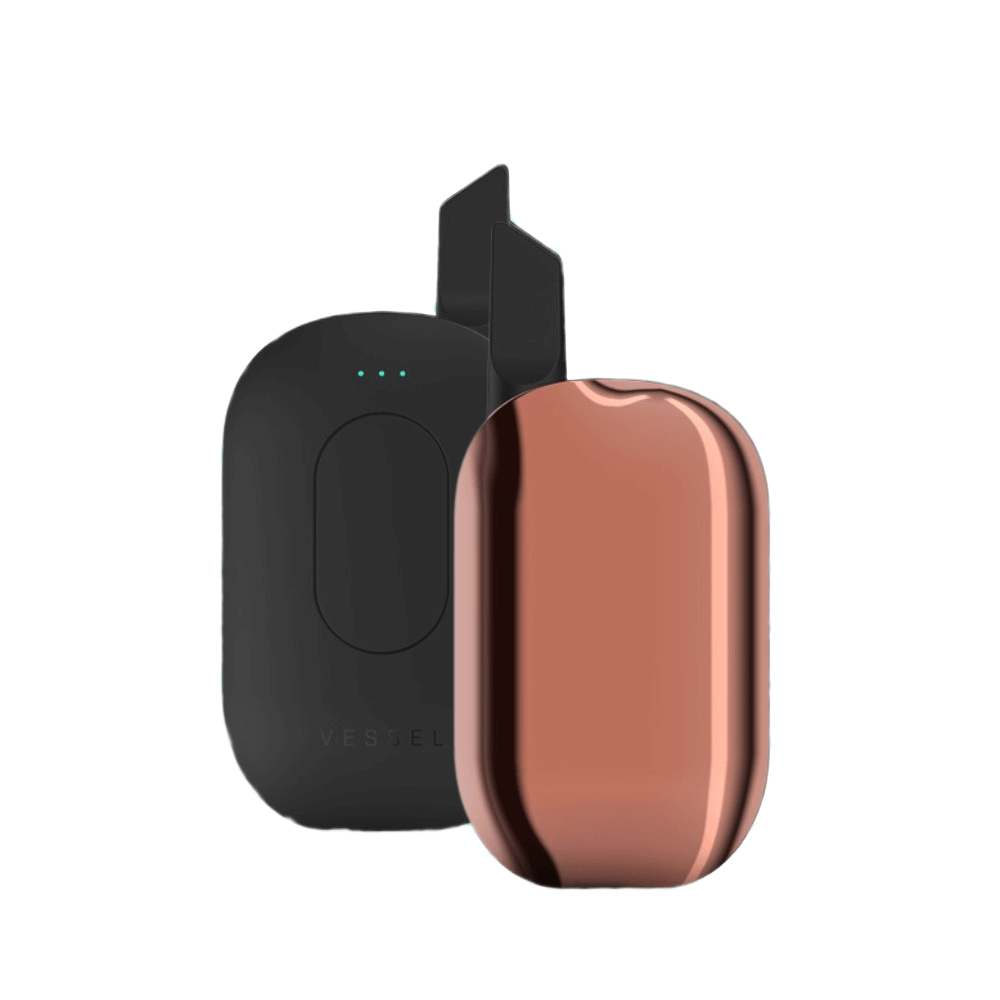 Vessel Compass vape pen in copper with black charging dock