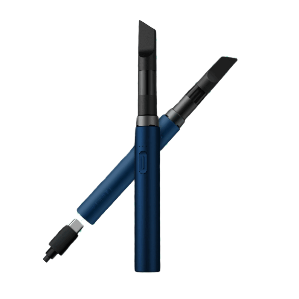 Vessel Core vape pen in navy with black mouthpiece and charging cable